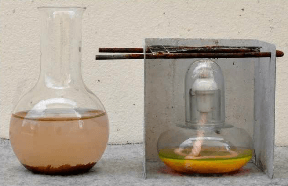 Fill distilled water beaker that has gold dregs